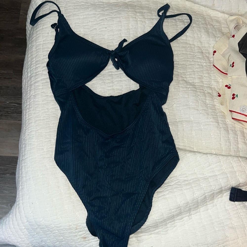 Kittenish one piece bikini